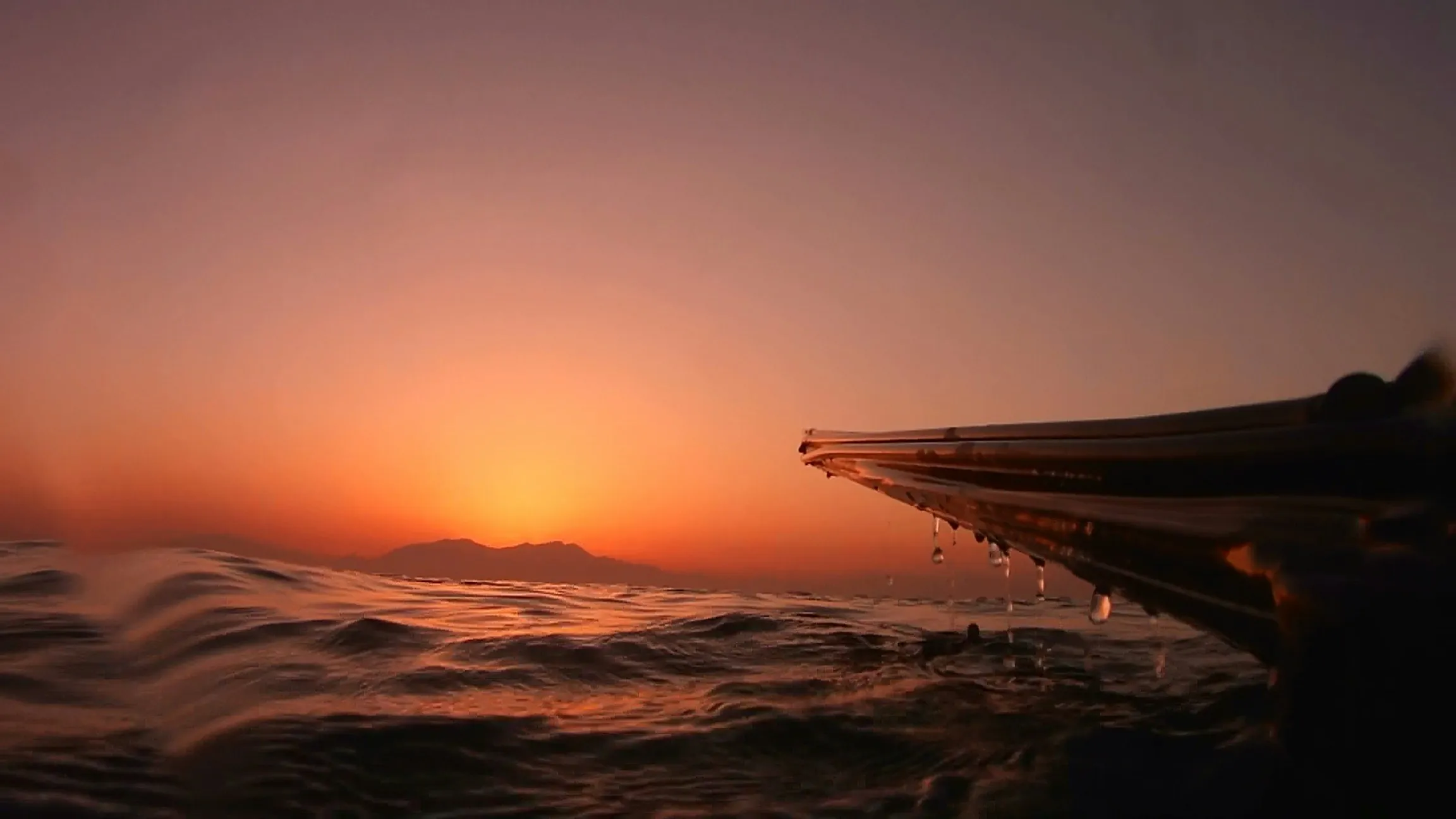 Sunset from the bow of a charter boat